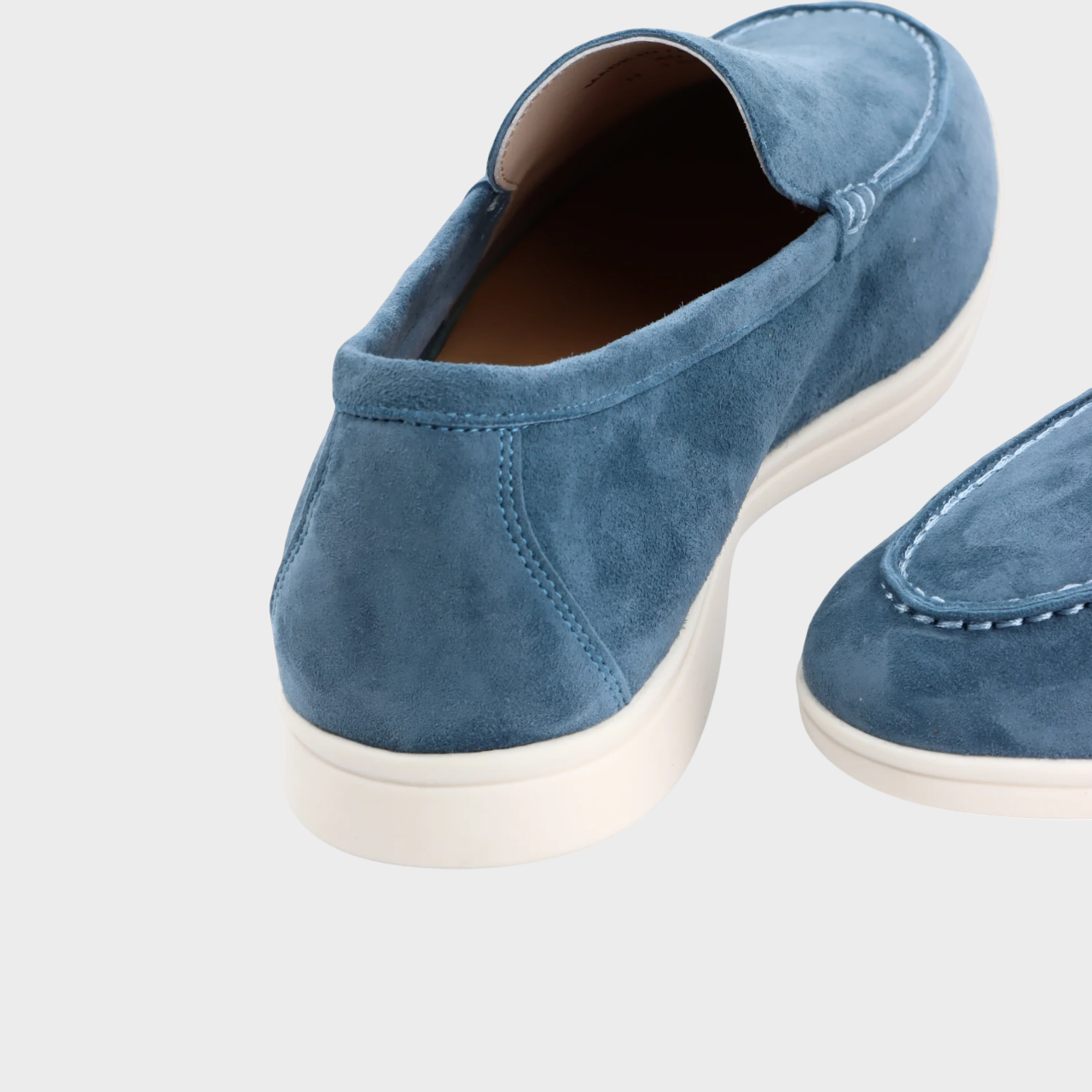 "Classic men’s dress loafers with minimal low-cut design"
