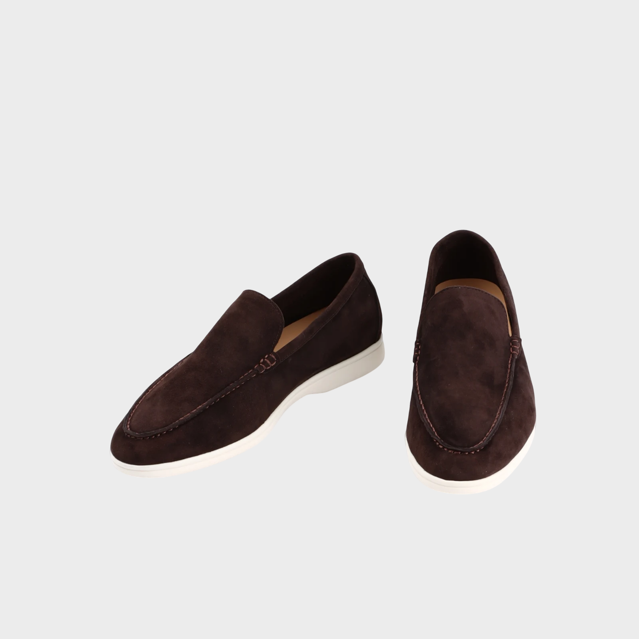 "Men’s classic low loafers with sleek leather finish, top view"
