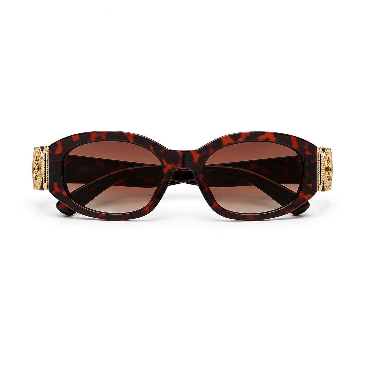 Oversized sunglasses with a dark brown and black tortoiseshell frame, brown tinted lenses, and ornate gold metal accents on the temples, shown against a plain white background.