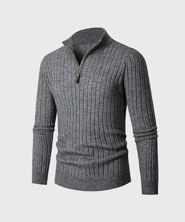 Gray ribbed sweater with a zipper on a light gray background