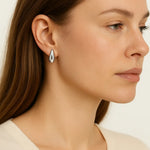 Alba earrings shown in a lifestyle setting, full length view