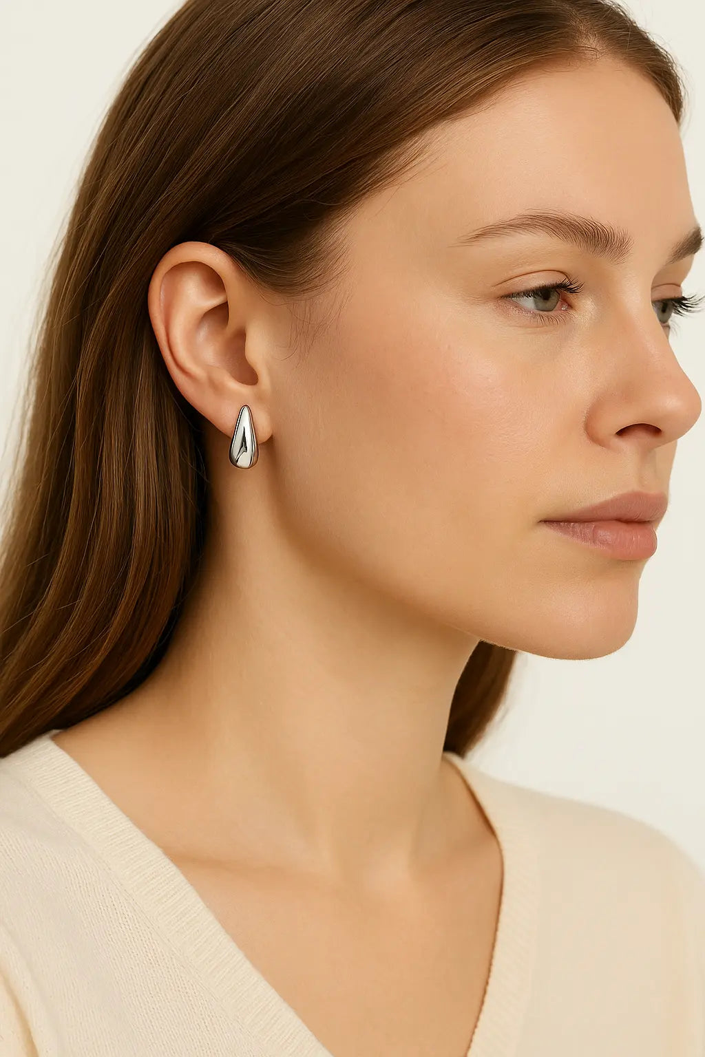 Alba earrings shown in a lifestyle setting, full length view