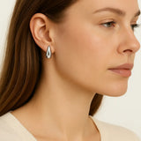 Alba earrings shown in a lifestyle setting, full length view