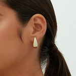 Alba earrings shown in a lifestyle setting