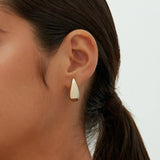 Alba earrings shown in a lifestyle setting