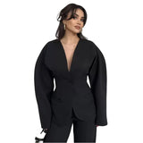 Black Alin Suit Set shown in a lifestyle setting