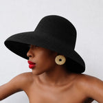 Ashford Hat shown in a lifestyle setting, alternate view