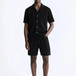 Bali - Short-Sleeved set shown in a lifestyle setting, full length view