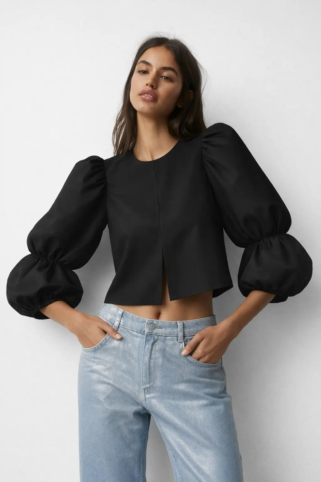 Balloon sleeve blouse shown in a lifestyle setting