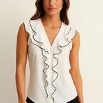 Belle Blouse shown in a lifestyle setting