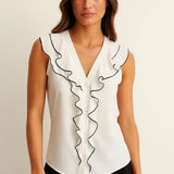 Belle Blouse shown in a lifestyle setting