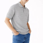 BIELLA Cable Knit Polo shown in a lifestyle setting, back angle view