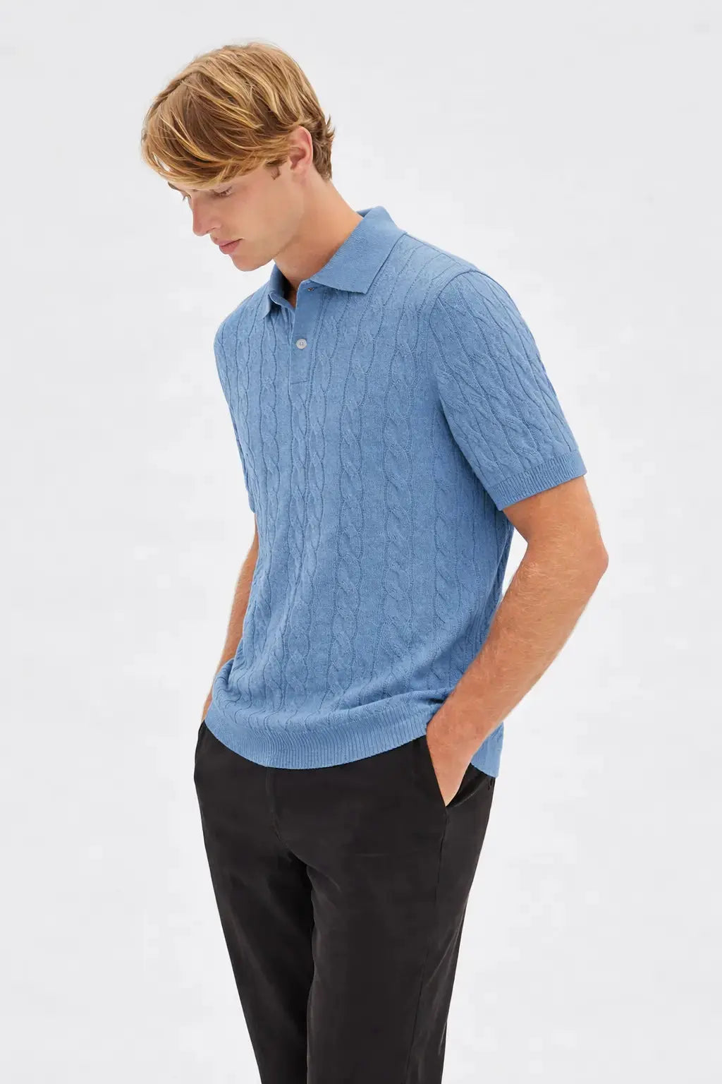 BIELLA Cable Knit Polo shown in a lifestyle setting, cropped view
