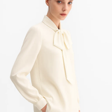 Bow Blouse shown in a lifestyle setting, alternate view