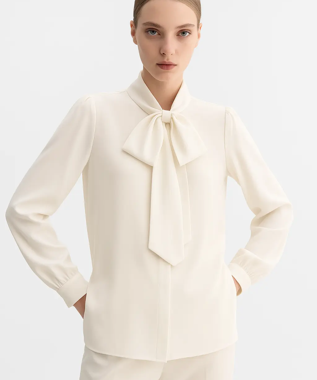 Bow Blouse shown in a lifestyle setting