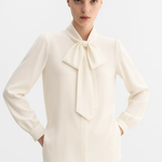 Bow Blouse shown in a lifestyle setting