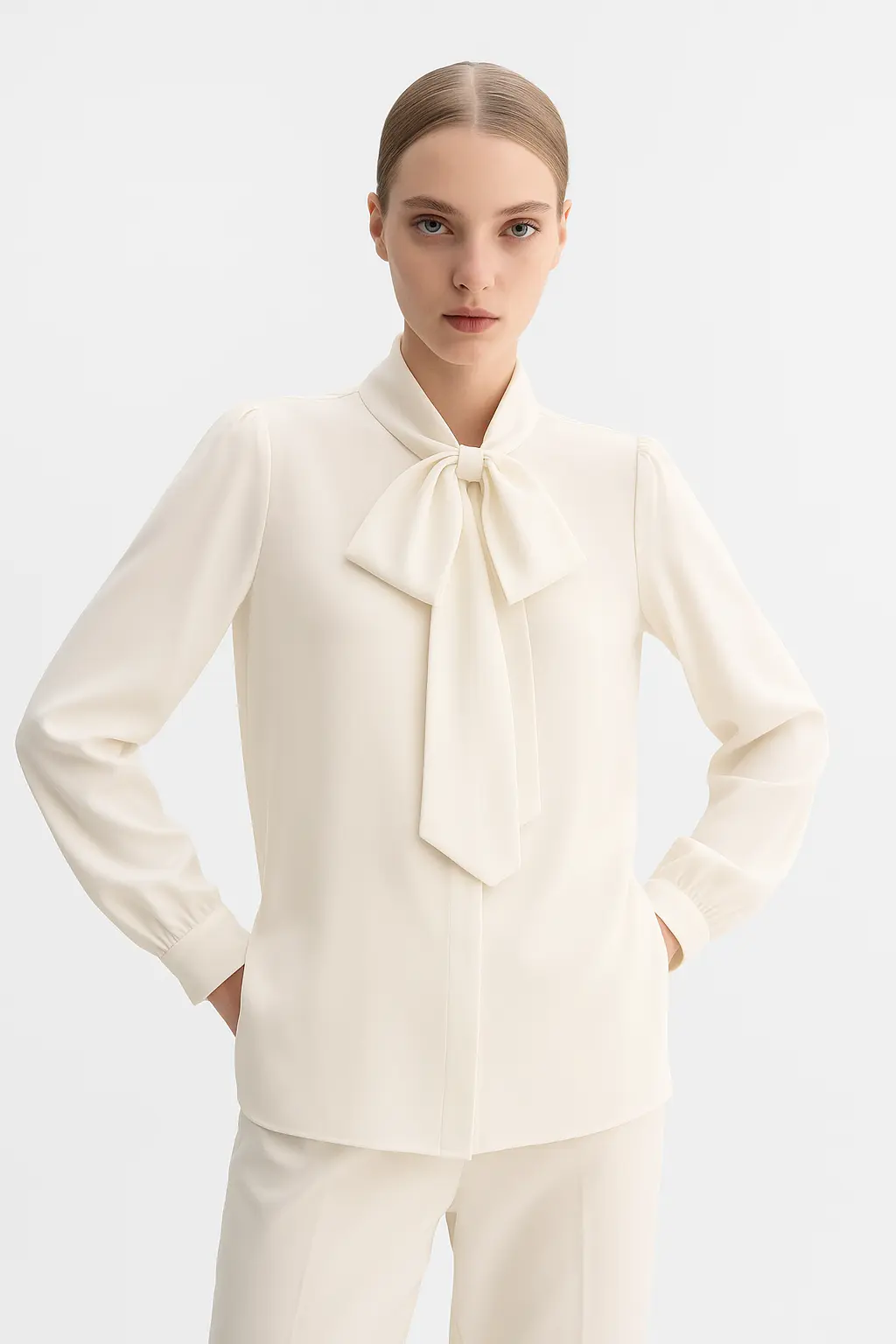 Bow Blouse shown in a lifestyle setting