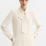 Bow Blouse shown in a lifestyle setting