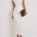 White Button Belle Dress shown in a lifestyle setting