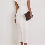 White Button Belle Dress shown in a lifestyle setting