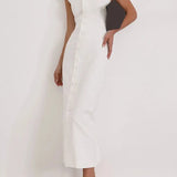 Button Belle Dress shown in a lifestyle setting