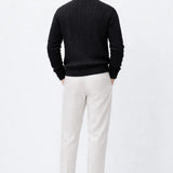 Cable Knit Half-Zip Sweater shown in a lifestyle setting, side angle view