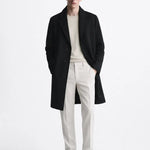 Calderin Coat shown in a lifestyle setting