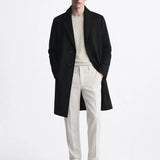 Calderin Coat shown in a lifestyle setting