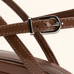 Close-up detail of Caressé Pumps