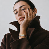 Celestia Ring shown in a lifestyle setting, alternate view