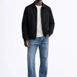 Cesare Full Zip Sweater shown in a lifestyle setting, cropped view