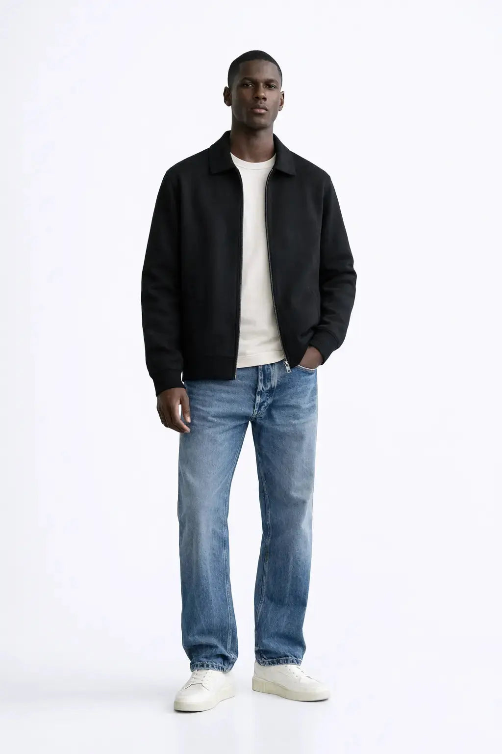 Cesare Full Zip Sweater shown in a lifestyle setting, cropped view
