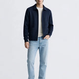 Cesare Full Zip Sweater shown in a lifestyle setting