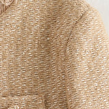 Close-up detail of Chic Tweed Jacket, hardware detail
