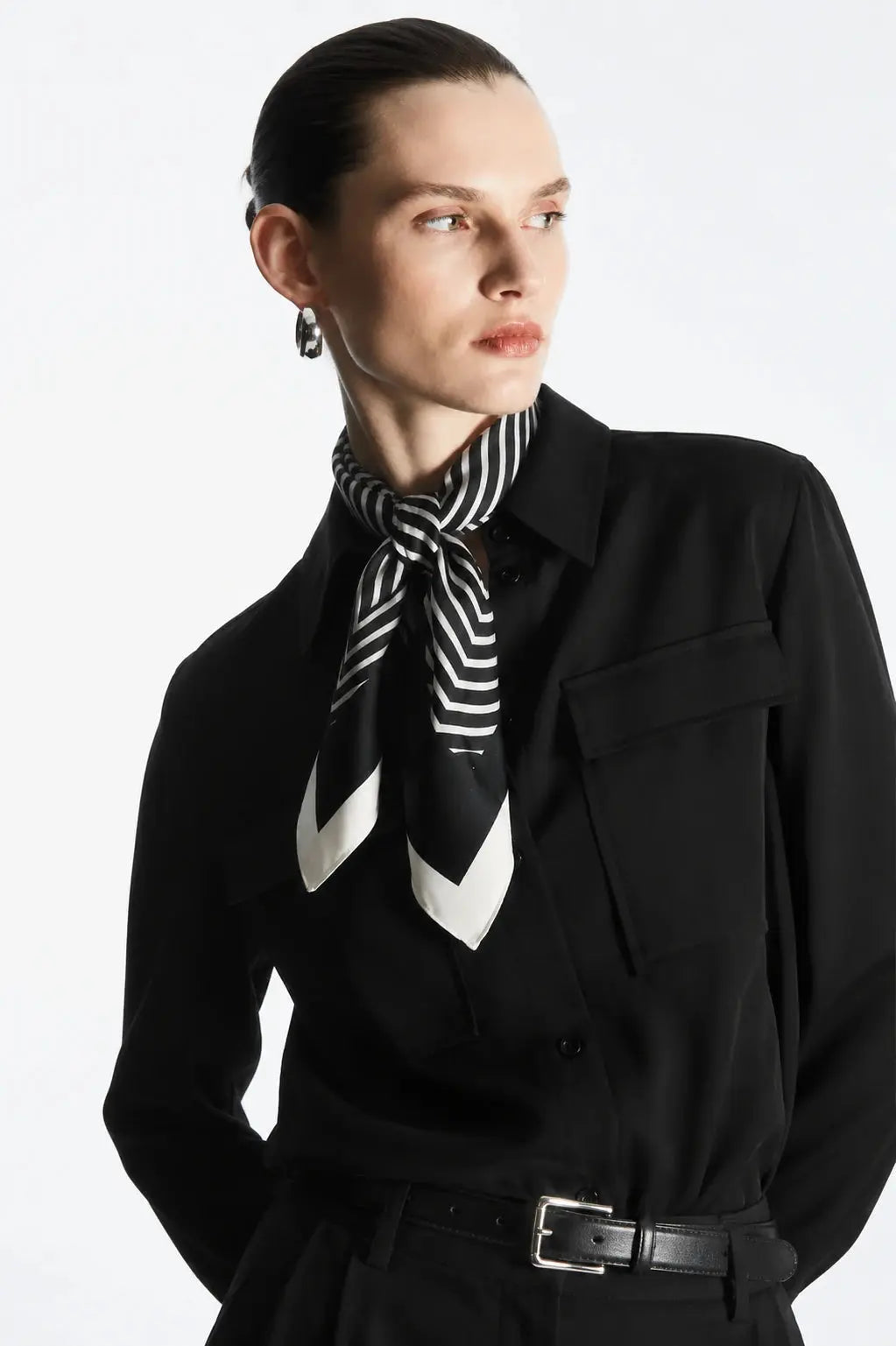 Cielé Scarf shown in a lifestyle setting, cropped view
