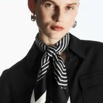 Cielé Scarf shown in a lifestyle setting, full length view