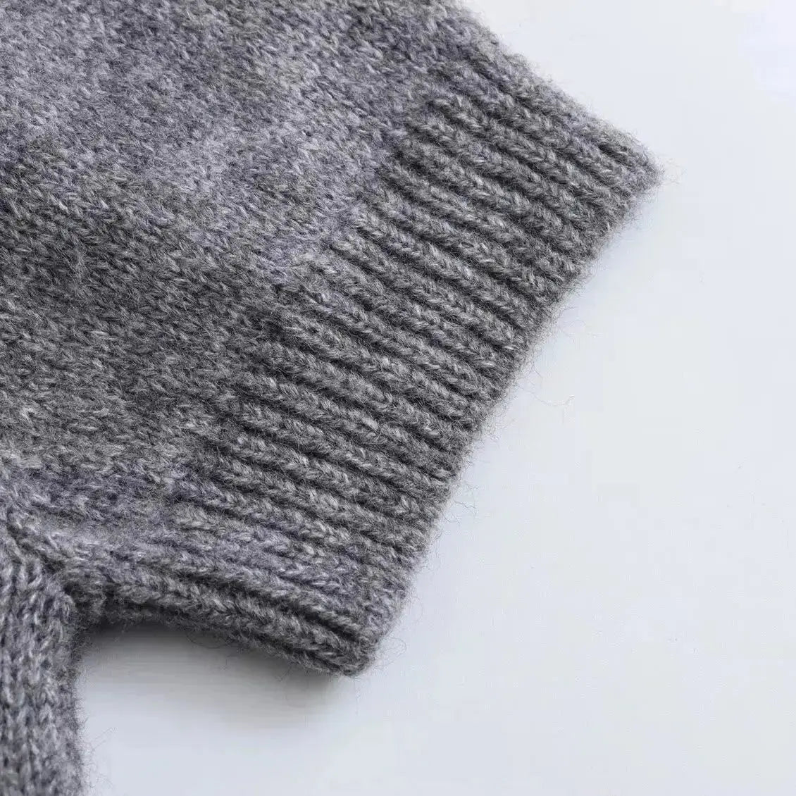 Close-up detail of Cinder Cardigan, hardware detail
