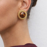 Clarendon Pearls Earrings shown in a lifestyle setting, full length view