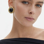 Clarendon Pearls Earrings shown in a lifestyle setting
