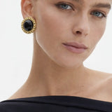 Clarendon Pearls Earrings shown in a lifestyle setting