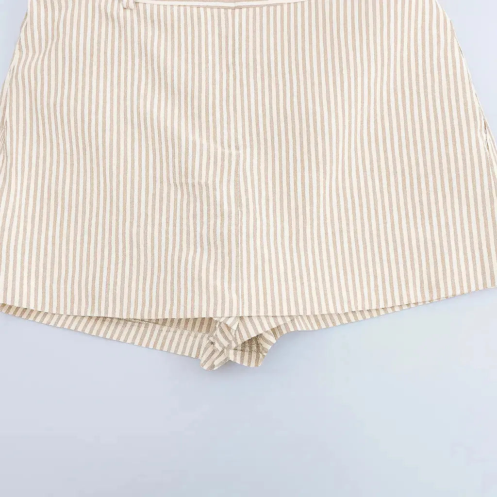 Coastal shorts shown in a lifestyle setting, cropped view