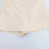 Coastal shorts shown in a lifestyle setting, cropped view