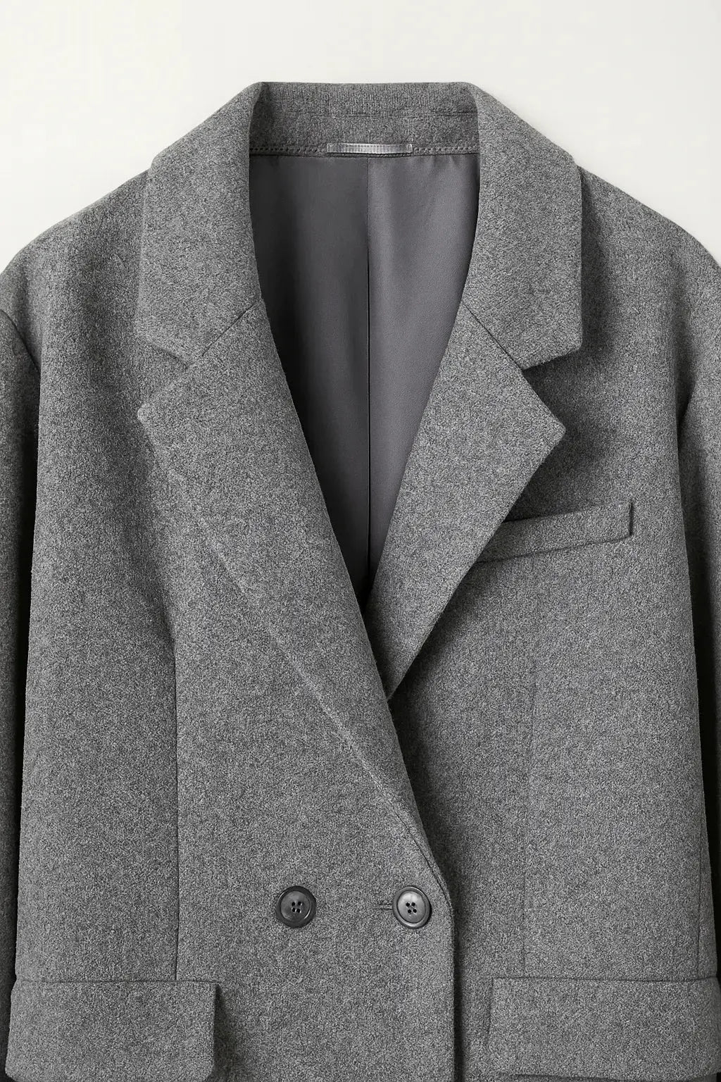 Close-up detail of Corvelle Coat, fabric detail