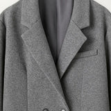 Close-up detail of Corvelle Coat, fabric detail