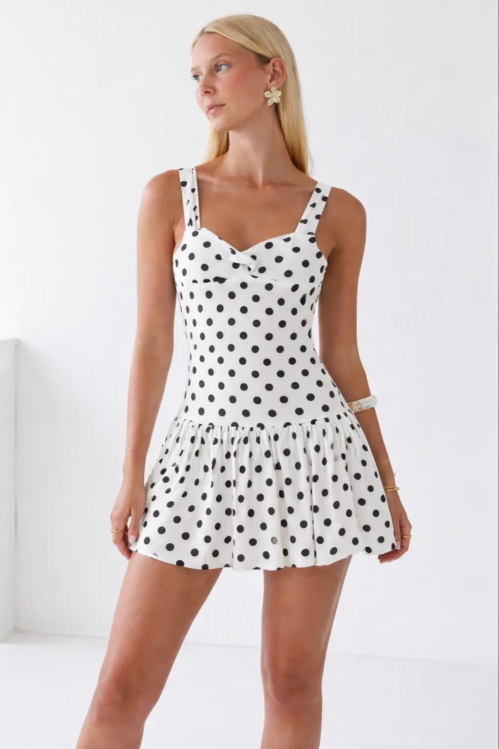 Dotty Dream Dress shown in a lifestyle setting, alternate view