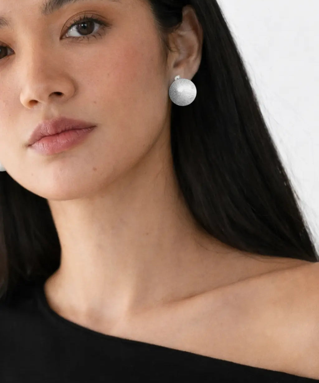Elara Ovals Earrings shown in a lifestyle setting