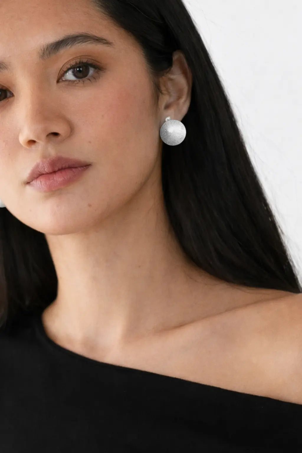Elara Ovals Earrings shown in a lifestyle setting