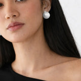 Elara Ovals Earrings shown in a lifestyle setting