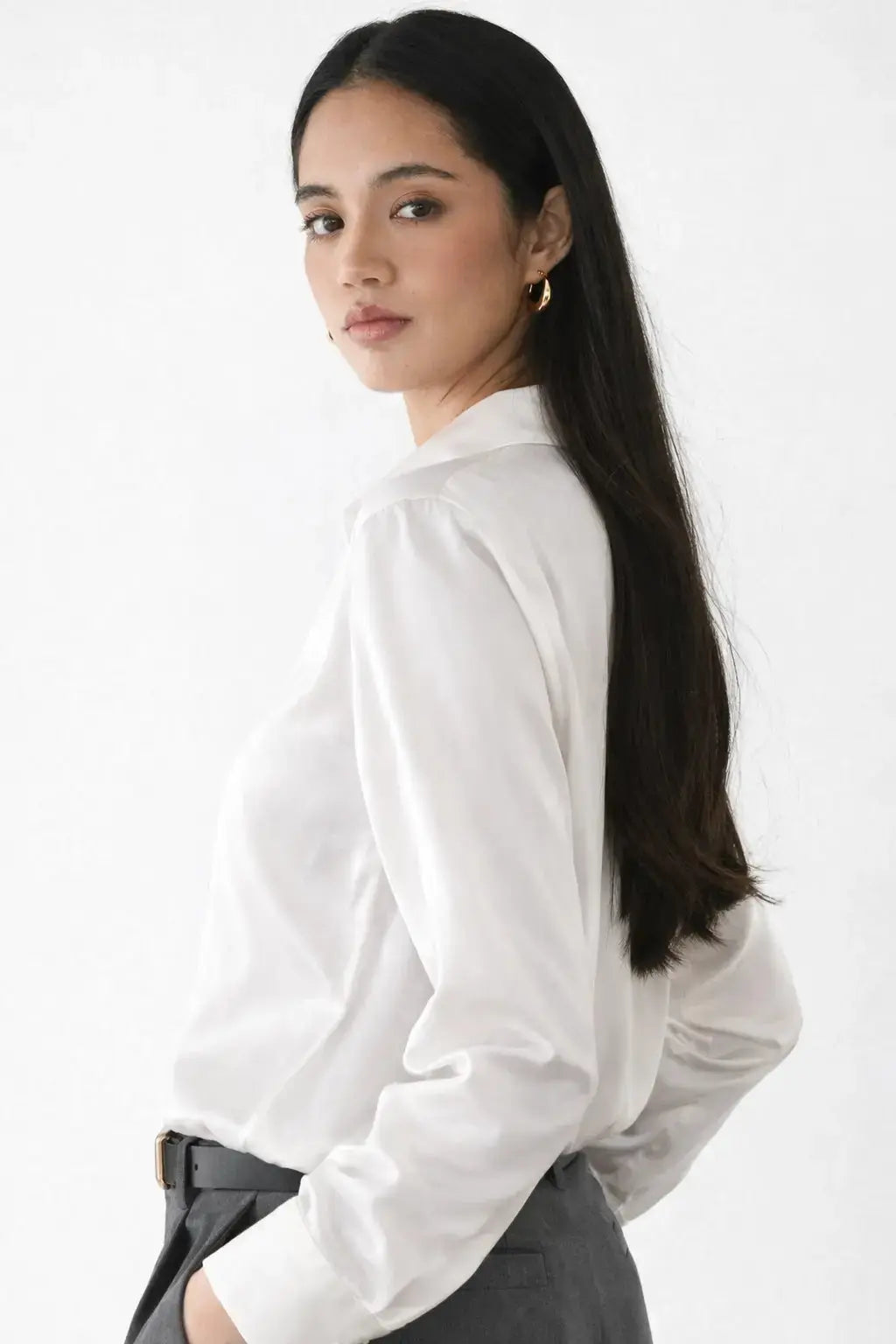 Elegant Satin Blouse shown in a lifestyle setting, walking view