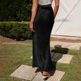 Elegant Women's Satin Skirt shown in a lifestyle setting